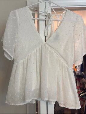 Lulu's White Swiss Dot Peplum Tie-Back Blouse